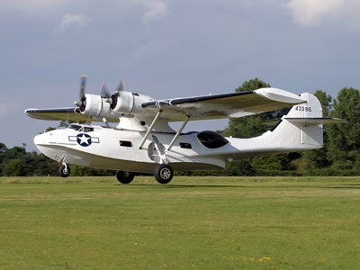 Our Catalina in the 8th Air Force Colours of 44-33915 landing at Rougham in the Summer of 2005. Photo: John Allan.