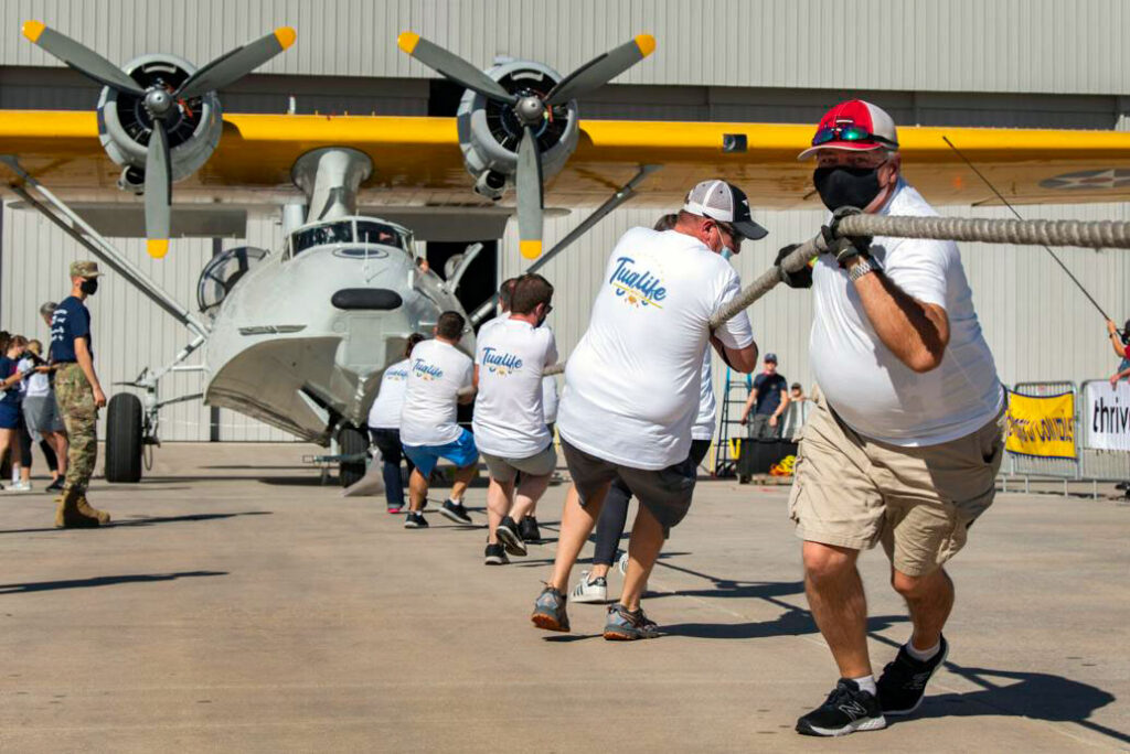 The Tuglife and RS&H team take the strain at the Pulling for a Purpose event at Colorado Springs last September as they pull Canso A N427CC across the ramp Christian Murdock/The Gazette